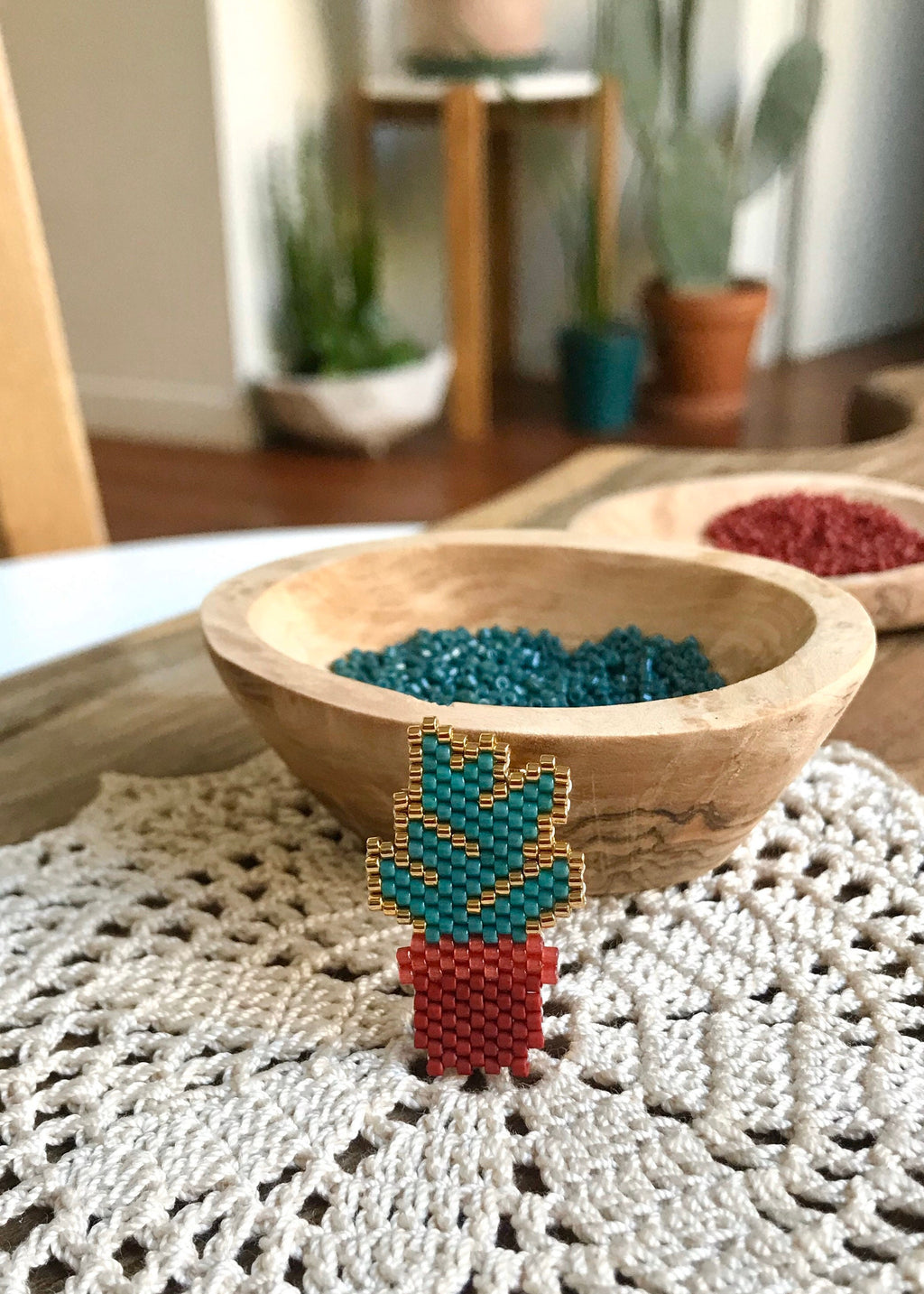 Broche plante verte