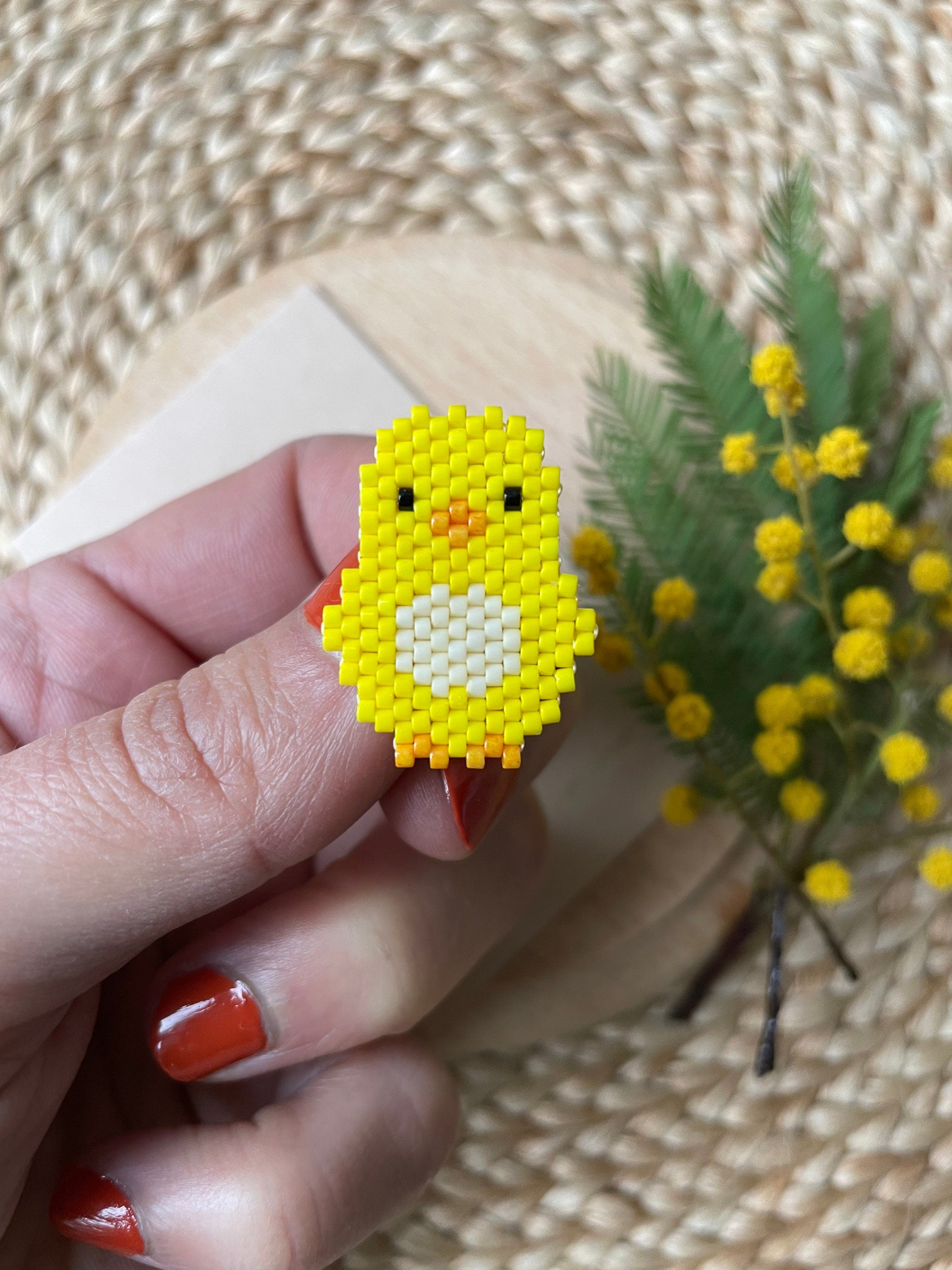 Broche Poussin